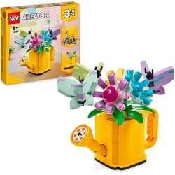 Gießkanne mit Blumen