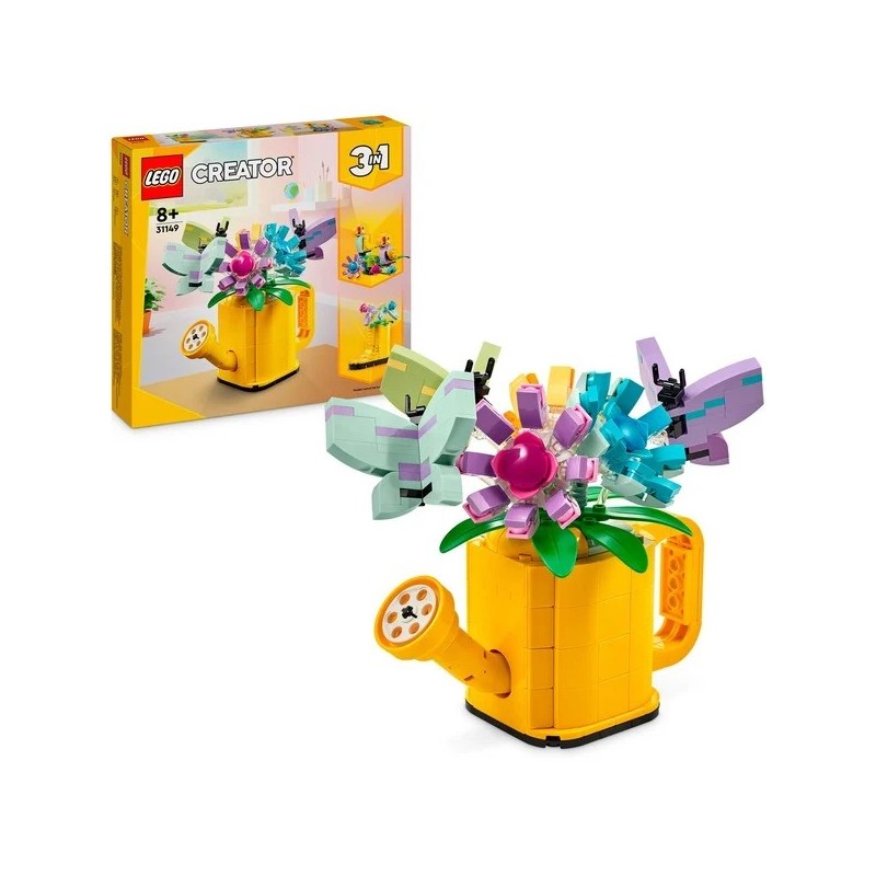 Gießkanne mit Blumen