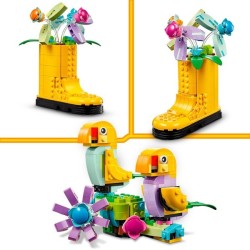 Gießkanne mit Blumen