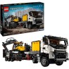 Volvo FMX LKW mit EC230 Electric Raupenbagger
