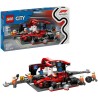 F1 Boxenstopp mit Boxencrew und Ferrari Flitzer