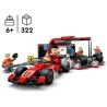 F1 Boxenstopp mit Boxencrew und Ferrari Flitzer